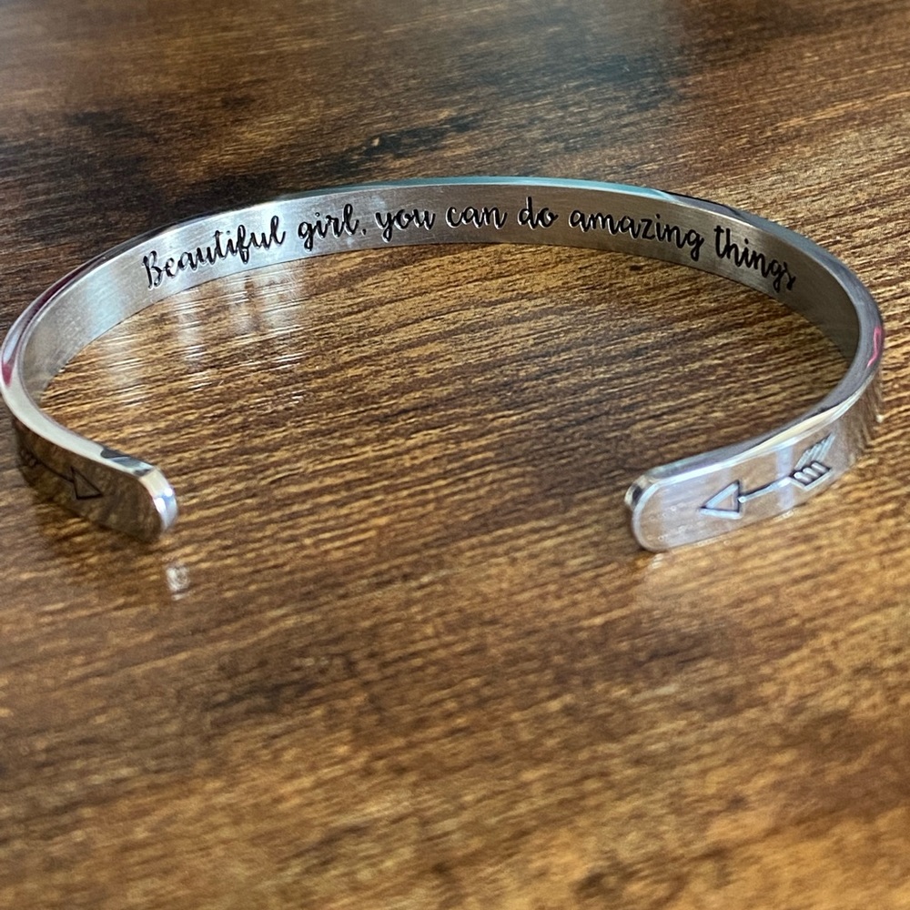 Cuff bracelet/ with arrow and inscription